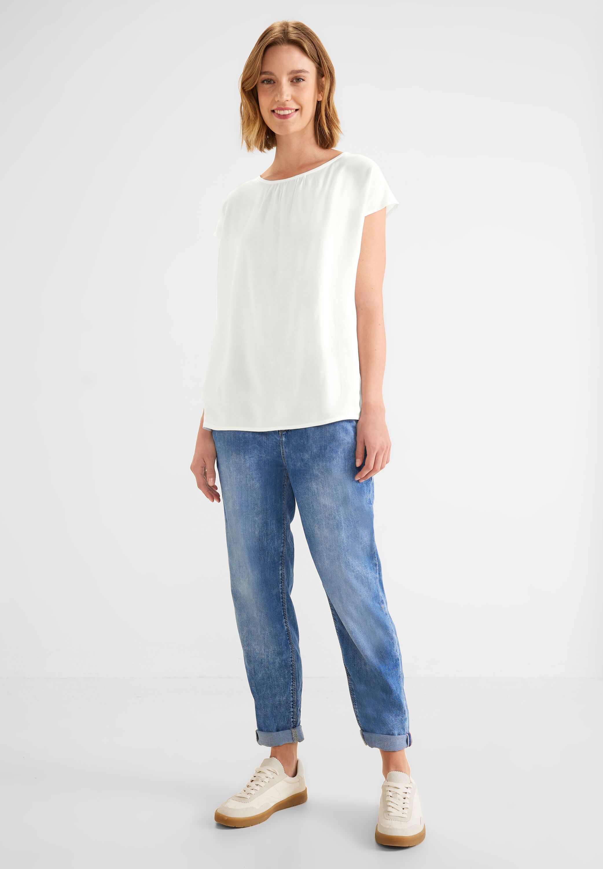 Bluse mit Raffungen