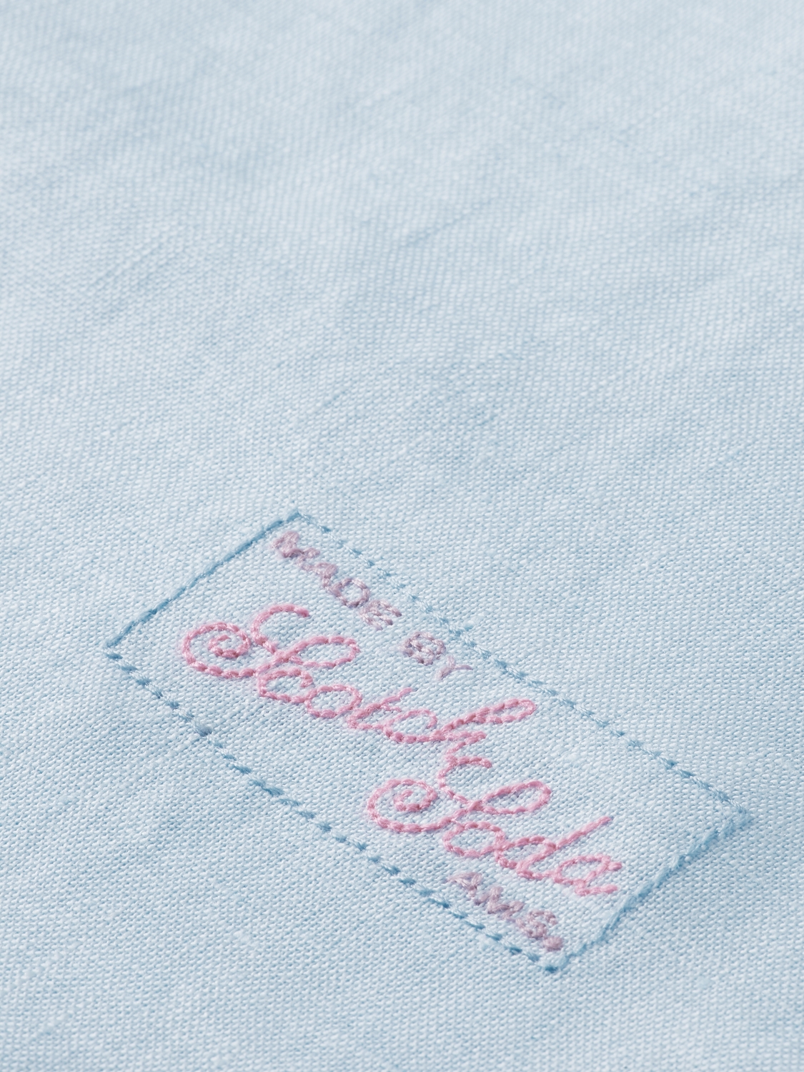 Linen shirt with sleeve roll-up